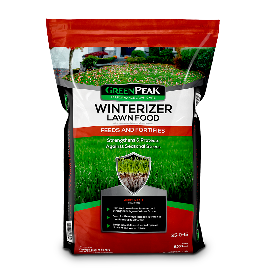 A red, white, and black bag of green peak winterizer lawn food feeds and fortifies on a white background