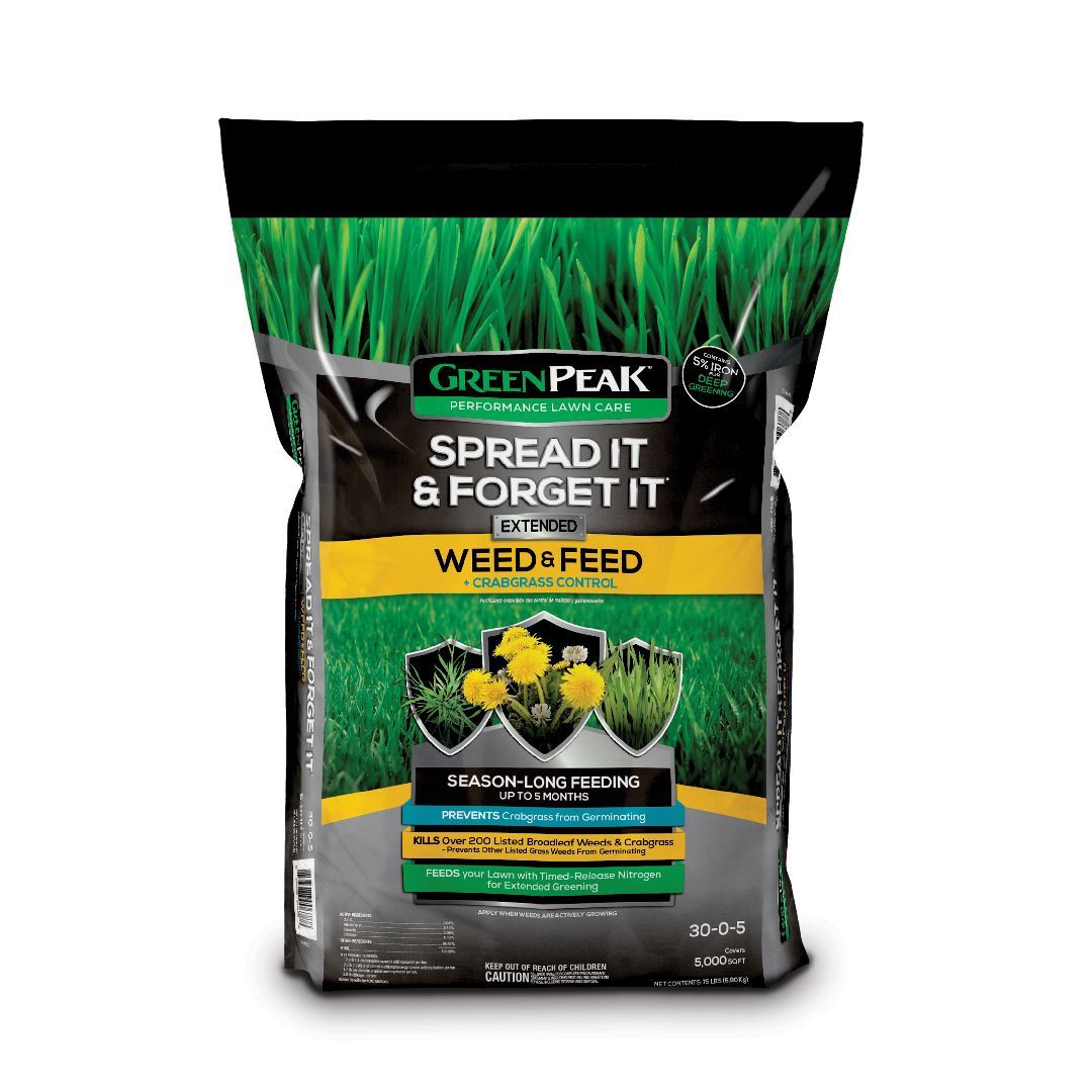 A bag of green peak spread it and forget it weed & feed.