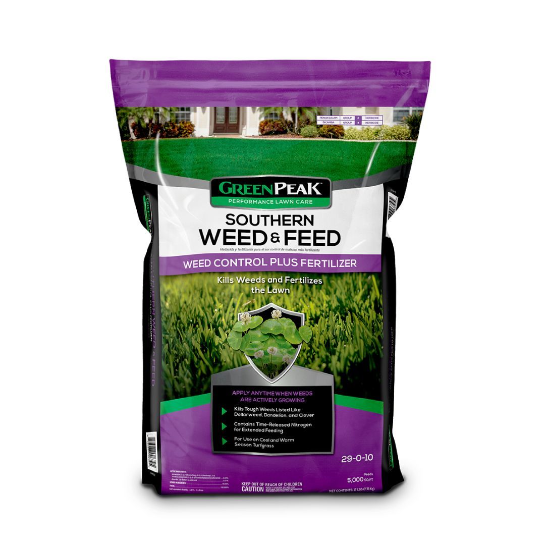 A bag of green peak southern weed & feed on a white background.