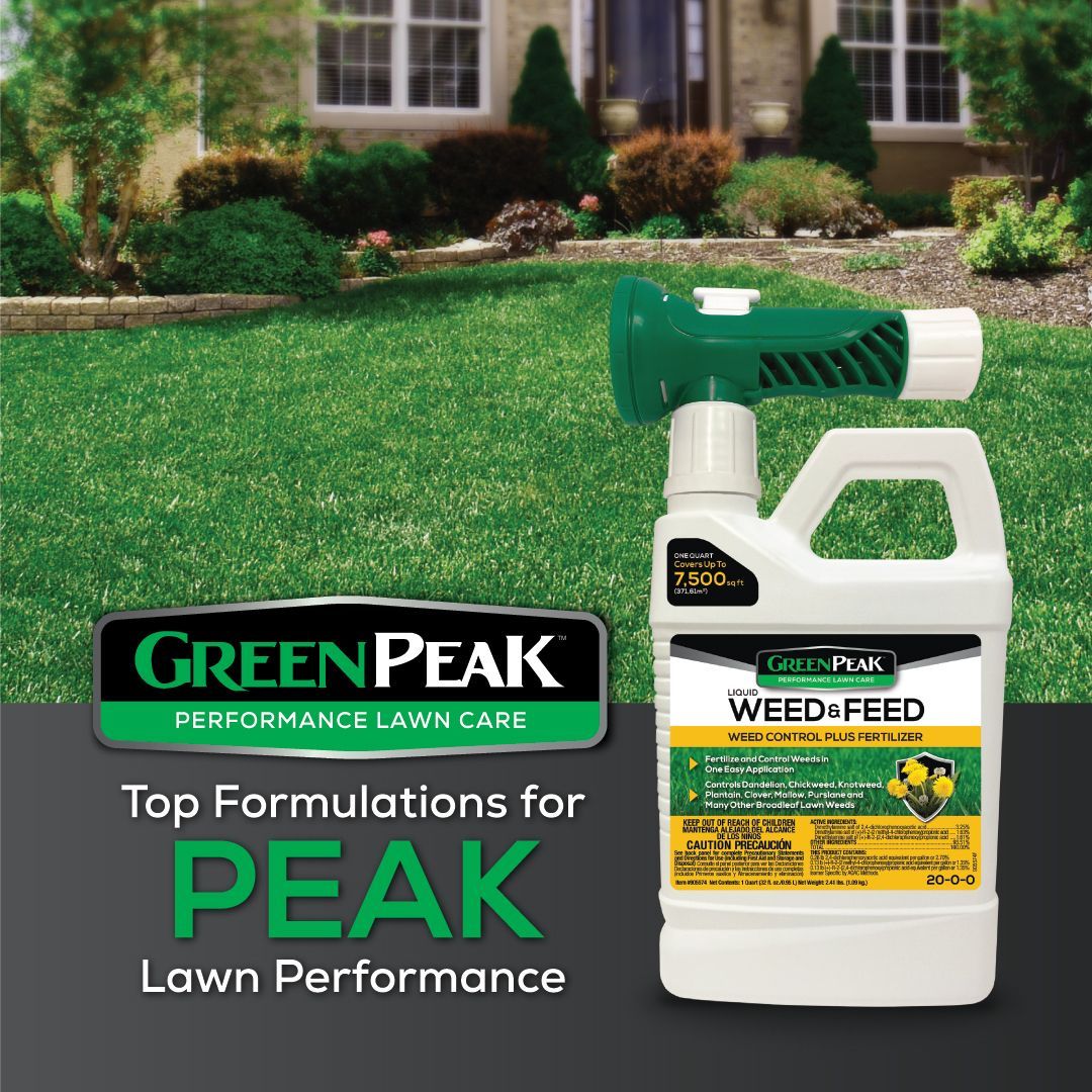 A bottle of green peak weed feed next to a lawn