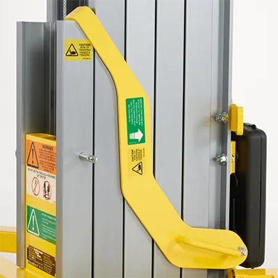 Carriage lock to hold mast sections in position during transport.