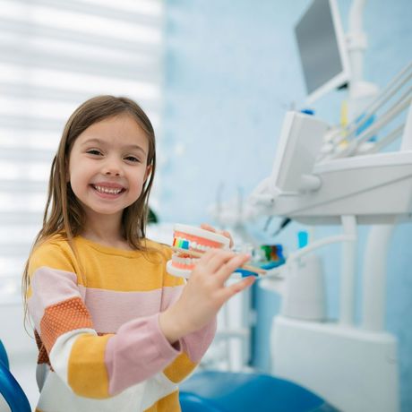 Little Girl At A Dental Clinic — Melbourne, FL — Theodore G. Schropp, DDS Little Girl At A Dental Clinic — Melbourne, FL — Theodore G. Schropp, DDS