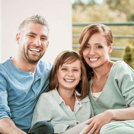 Happy Family — Melbourne, FL — Theodore G. Schropp, DDS Happy Family — Melbourne, FL — Theodore G. Schropp, DDS