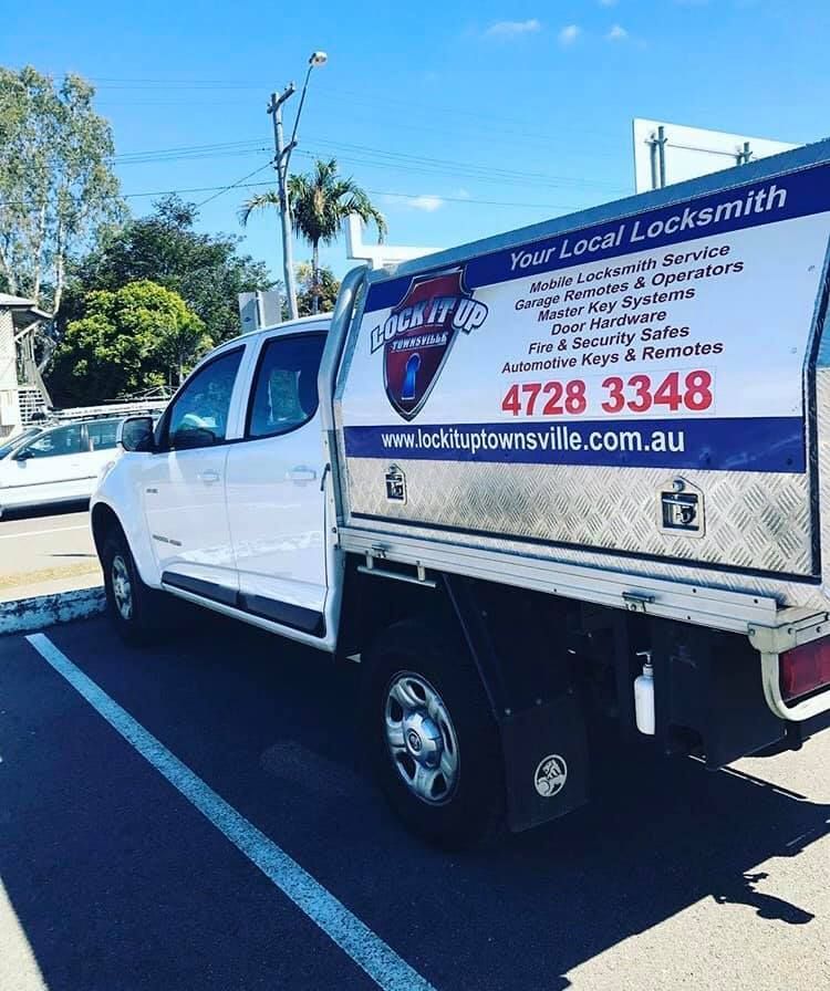 A White Truck Is Parked In A Parking Lot — Lock It Up Townsville In Aitkenvale, QLD