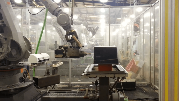 Robotic trimming cell at the Uniforce plant in Conway, Arkansas