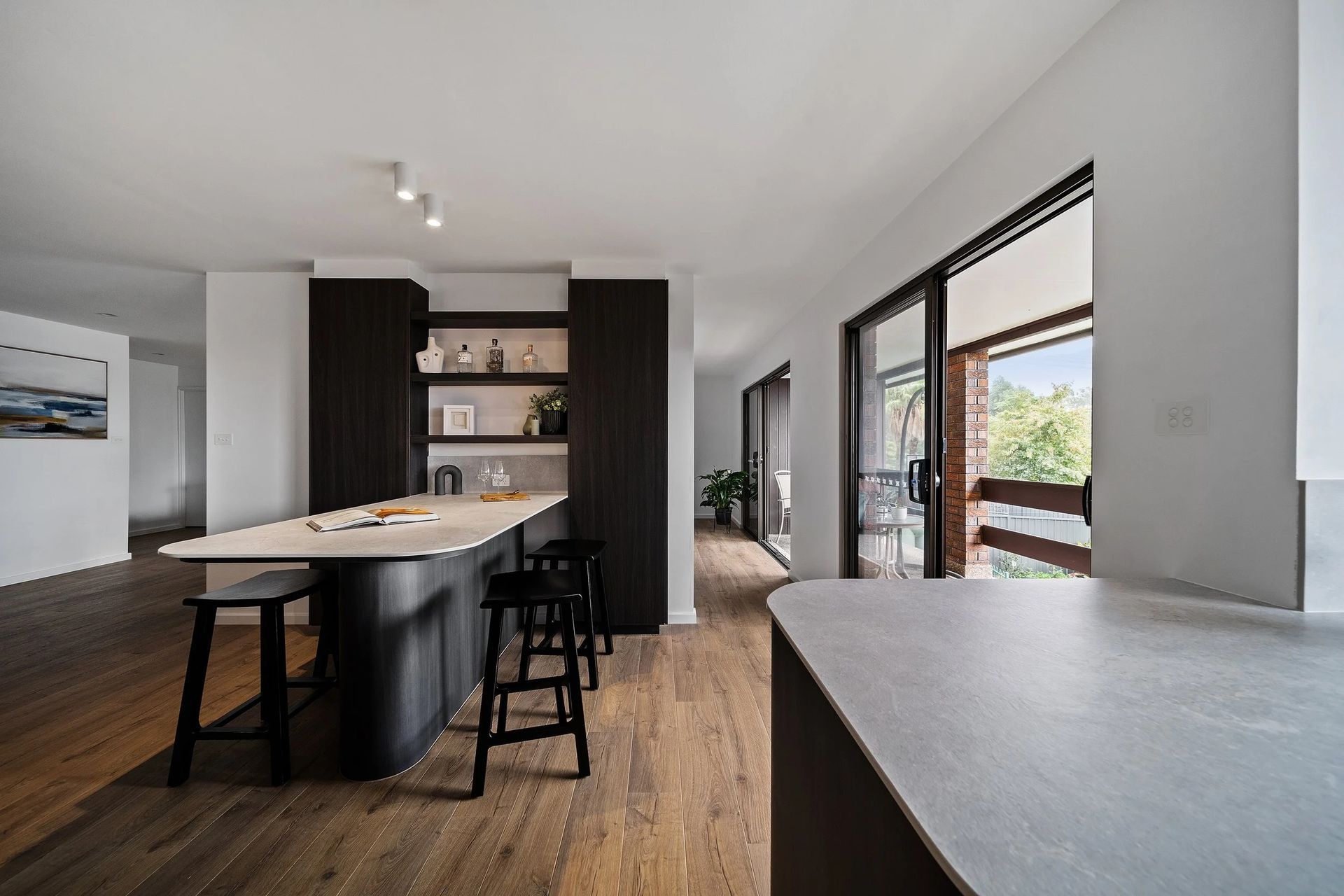 Modern Kitchen With Dark Cabinetry — Onyx Detailed Joinery in Unanderra, NSW