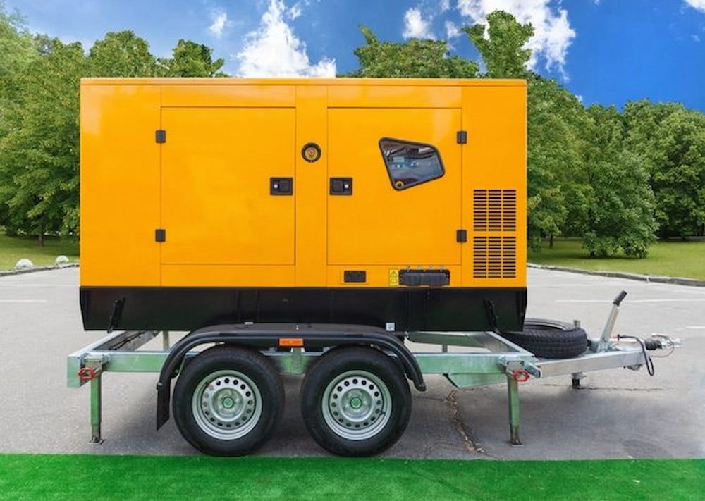 A Yellow Generator is on a Trailer in a Park — Chaffey Power in West Mackay, QLD