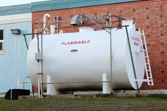 A Large White Tank That Says Flammable on It — Chaffey Power in Rockhampton, QLD