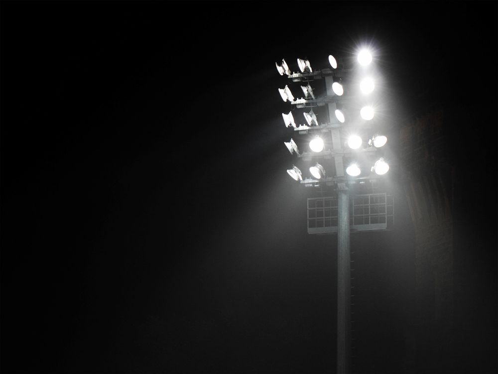 A Stadium Light is Shining Brightly in the Dark — Chaffey Power in Gladstone, QLD