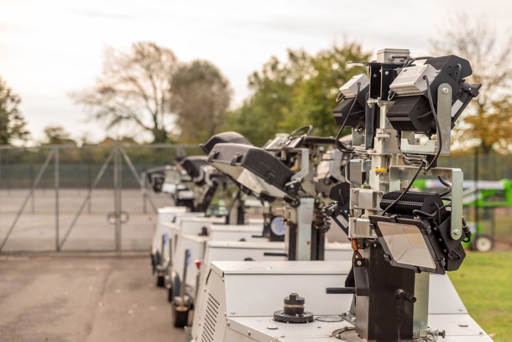 A Row of Cameras Are Lined Up in a Parking Lot — Chaffey Power in Rockhampton, QLD