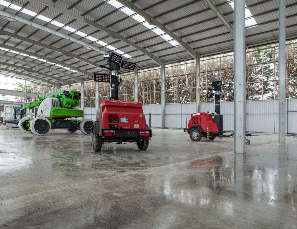A Large Warehouse With a Lot of Machinery in It — Chaffey Power in West Mackay, QLD