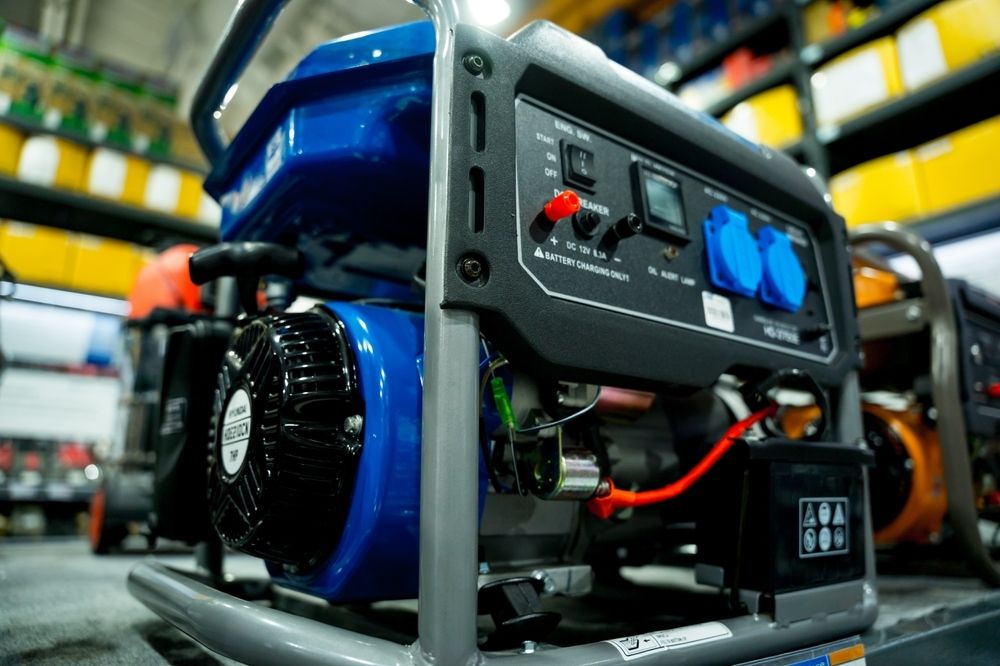 A Blue and Black Generator is Sitting on a Shelf in a Warehouse — Chaffey Power in Blackwater, QLD
