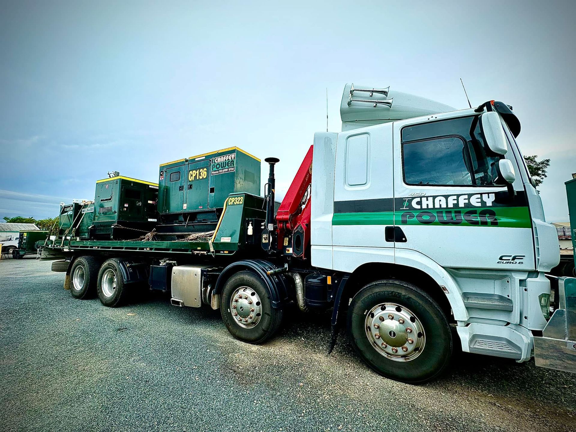 Portable generator hire - Two large generators on the back of a truck in Mackay