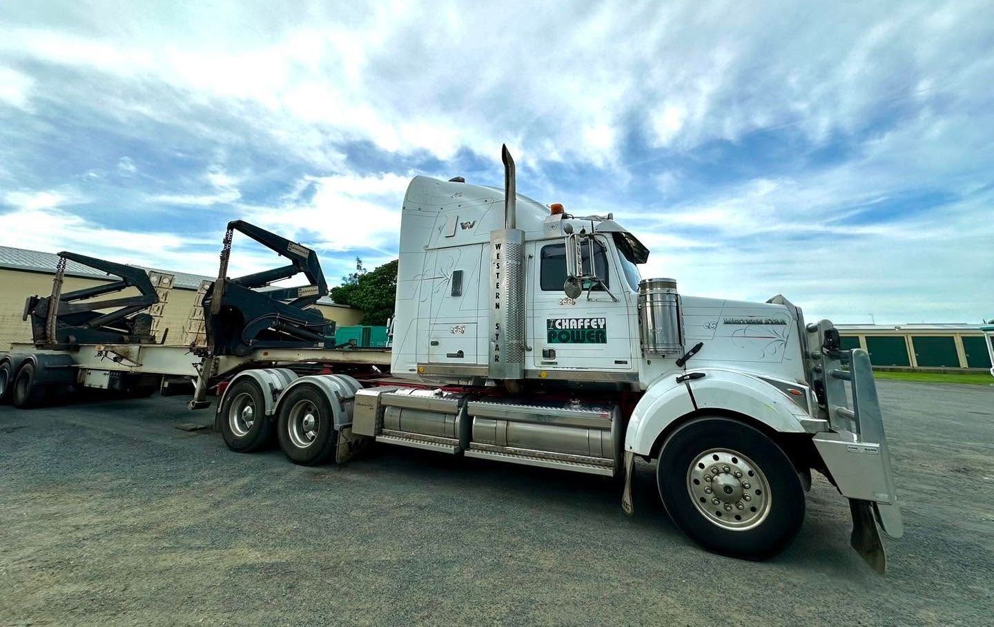 Truck Transporting Heavy Equipment