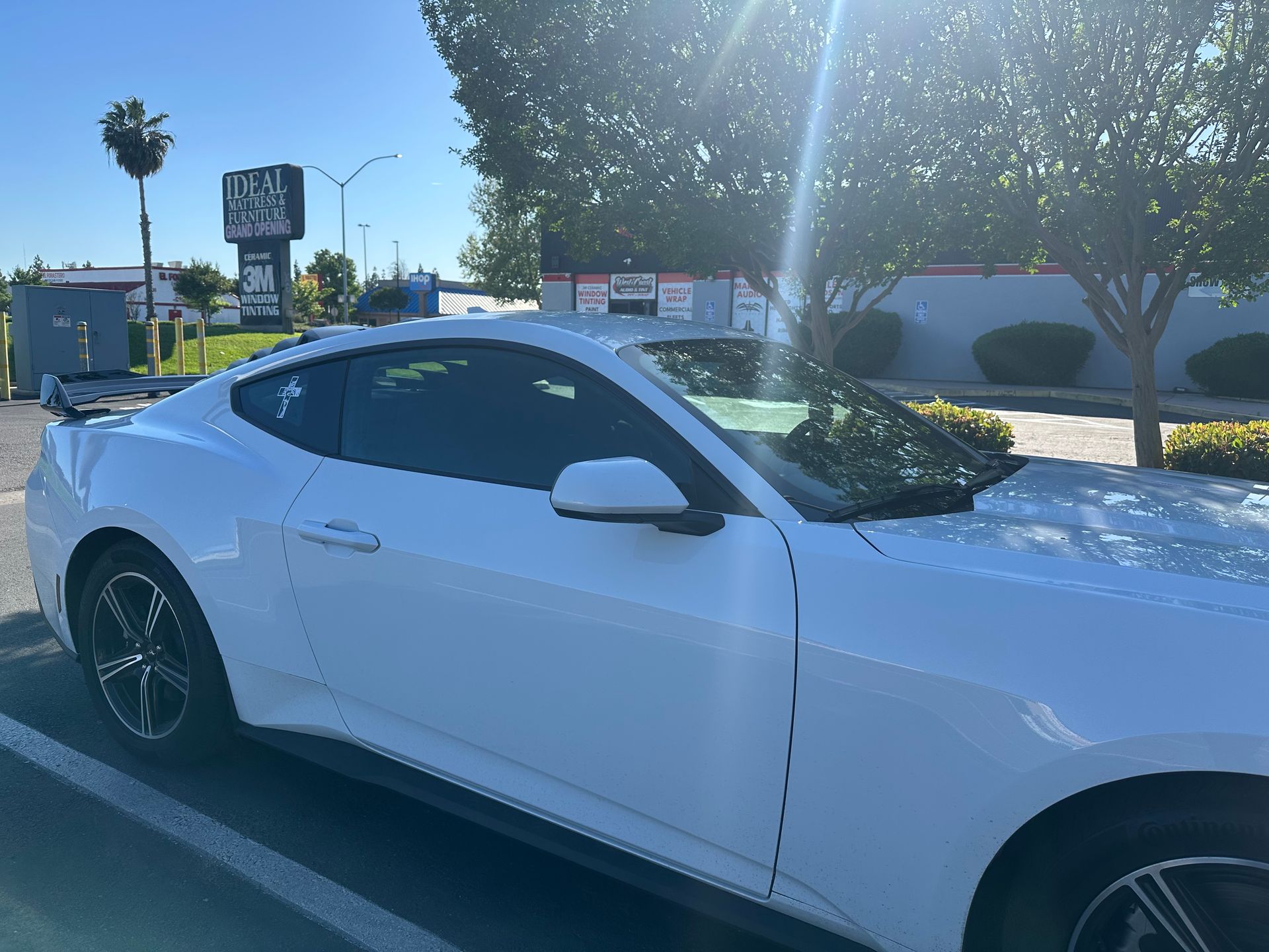 White Mustang with professionally installed window tint