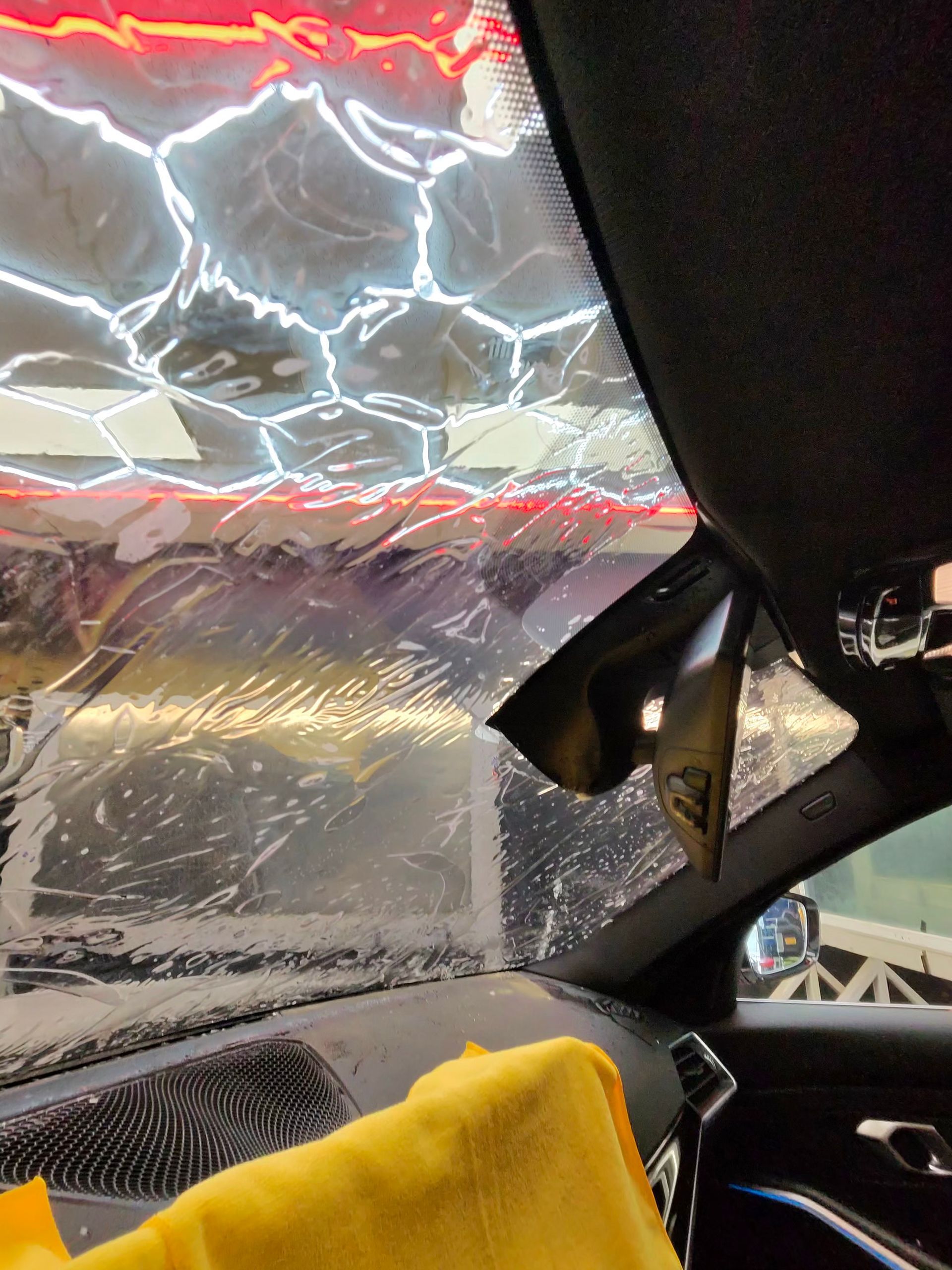 Window film being installed inside a vehicle