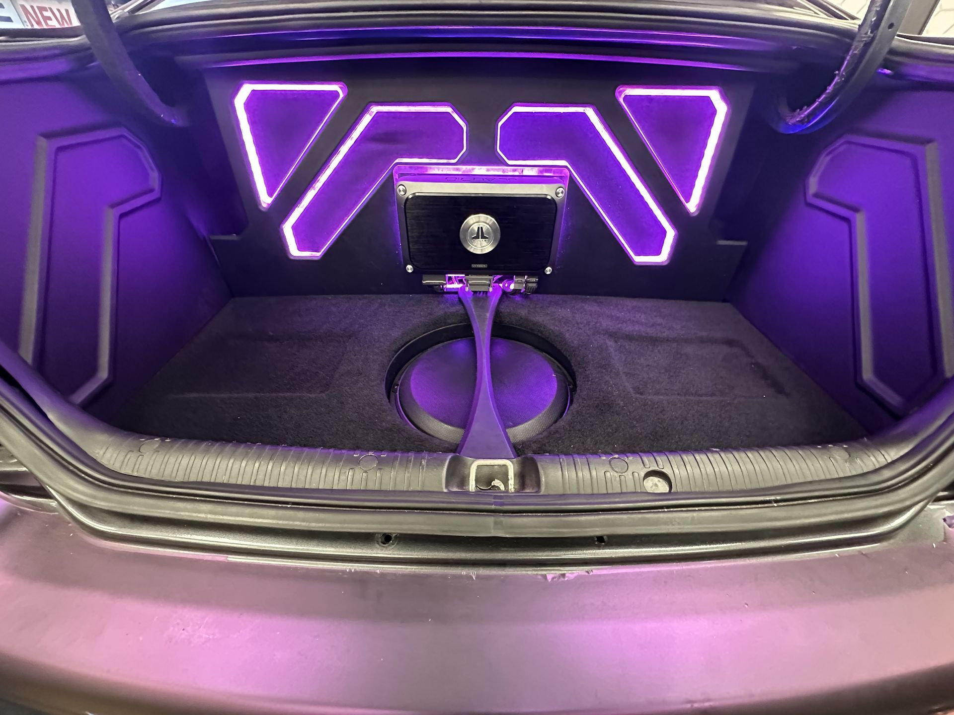 Front view of the completed Pontiac GTO custom trunk audio installation