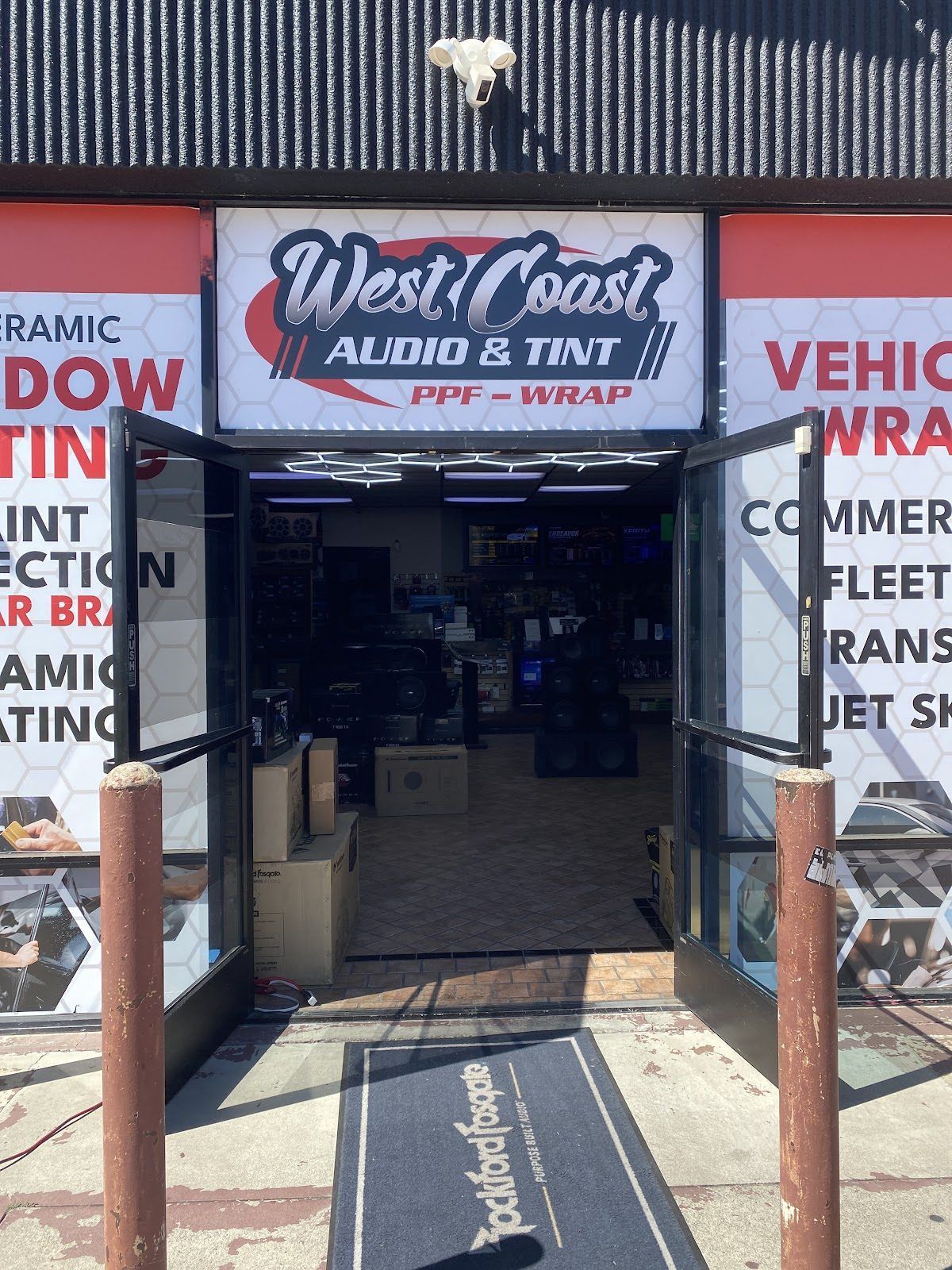 West Coast Audio and Tint storefront with PPF and wrap signage