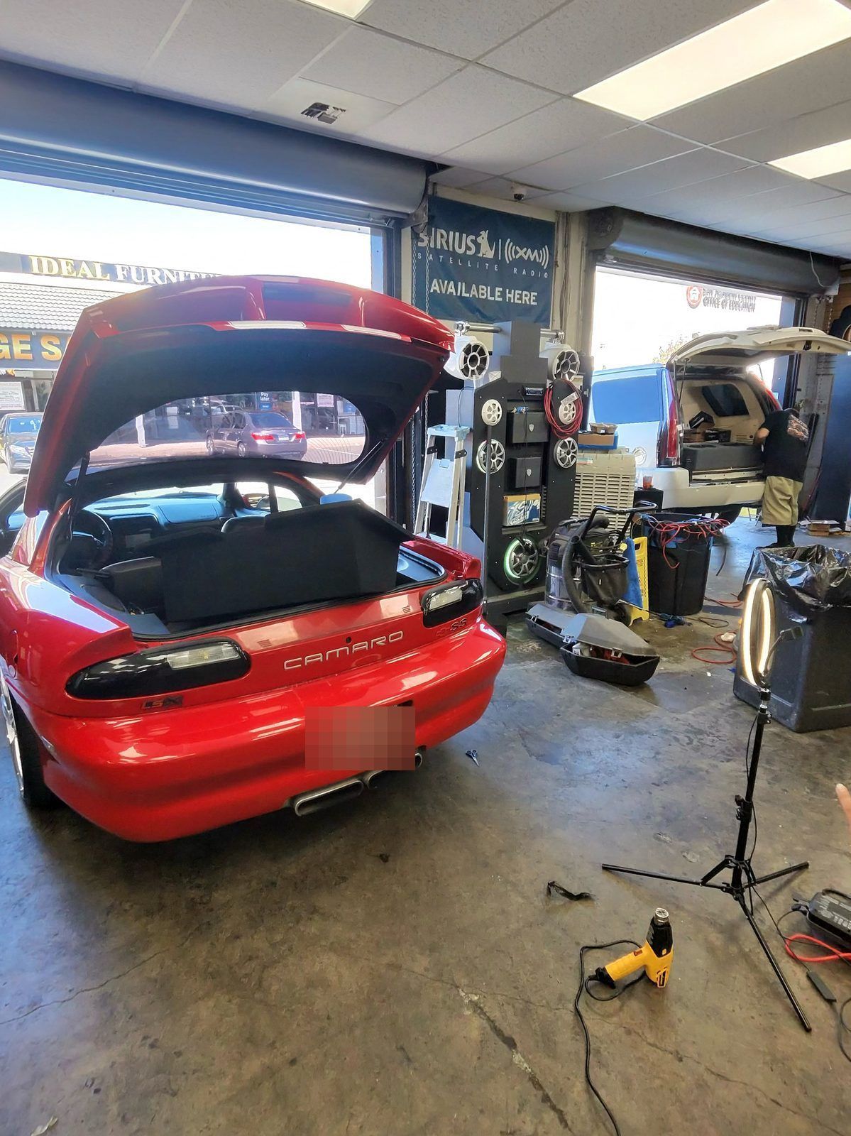 Red Chevrolet Camaro SS in the West Coast bay for film work
