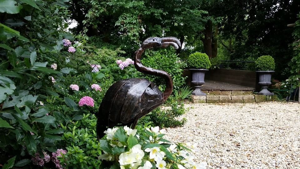 statua pavone di giardino