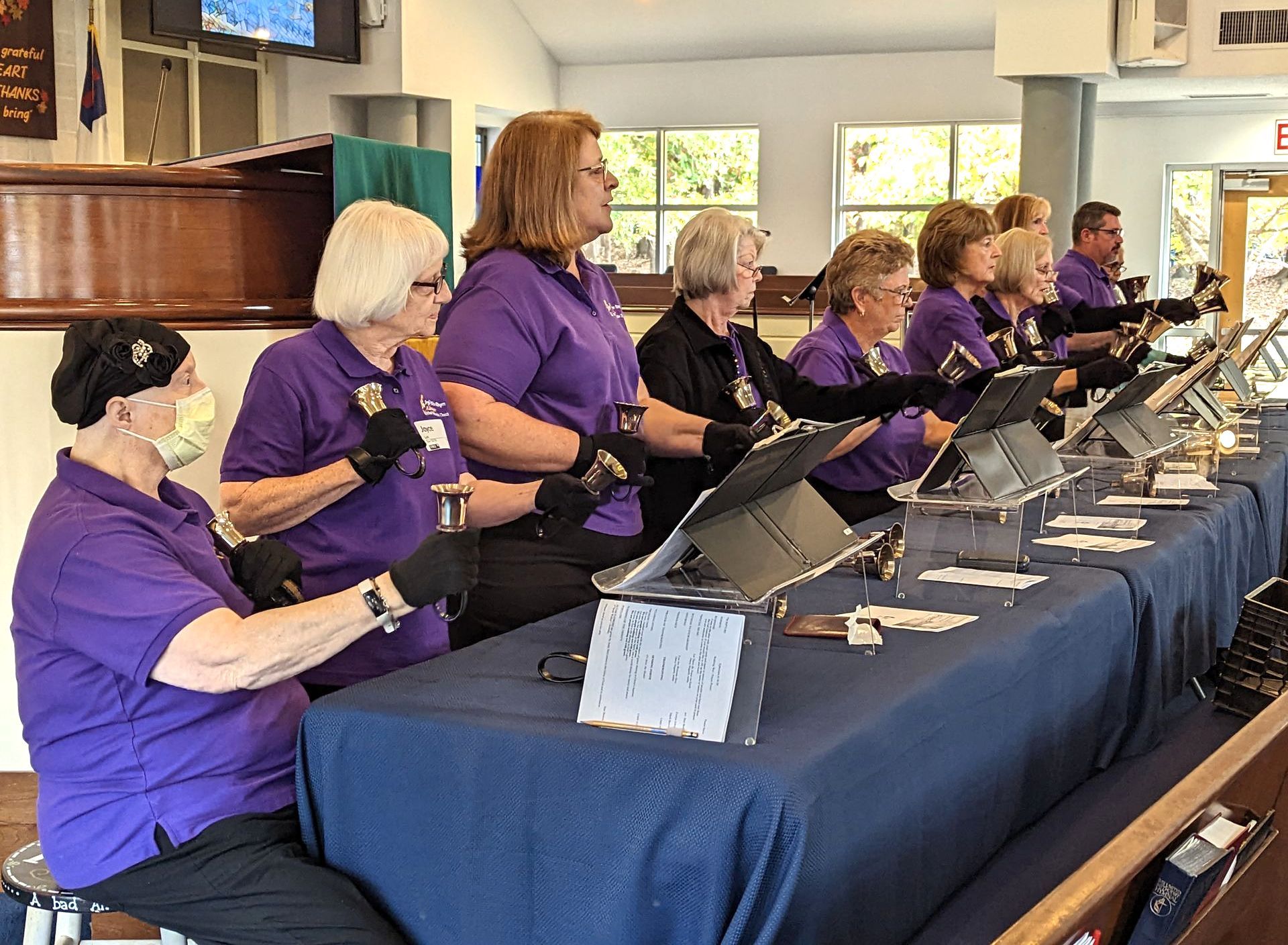 The handbell choir plays at Aldersgate United Methodist Church in north Durham