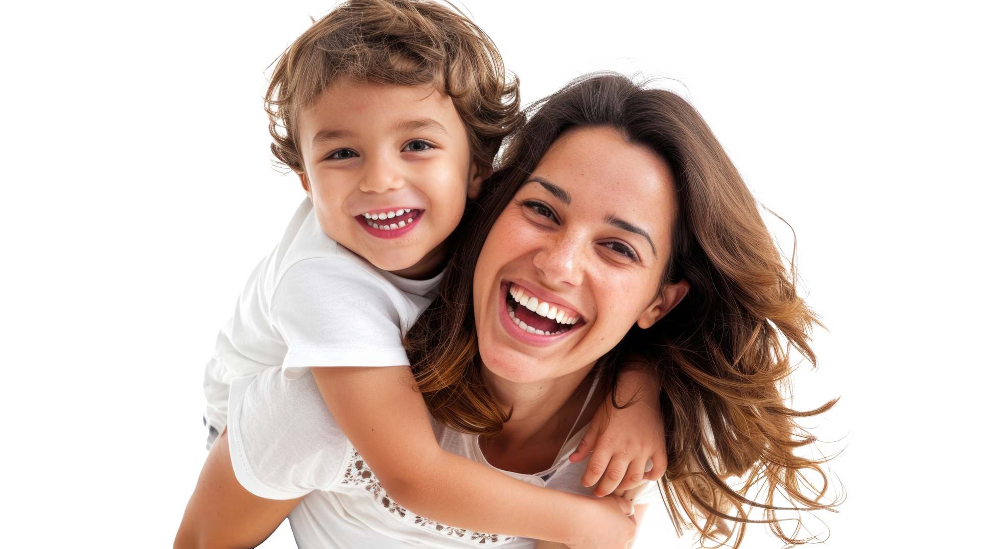 Two children smiling. Boy has freckles, girl has long hair. Both have white teeth.
