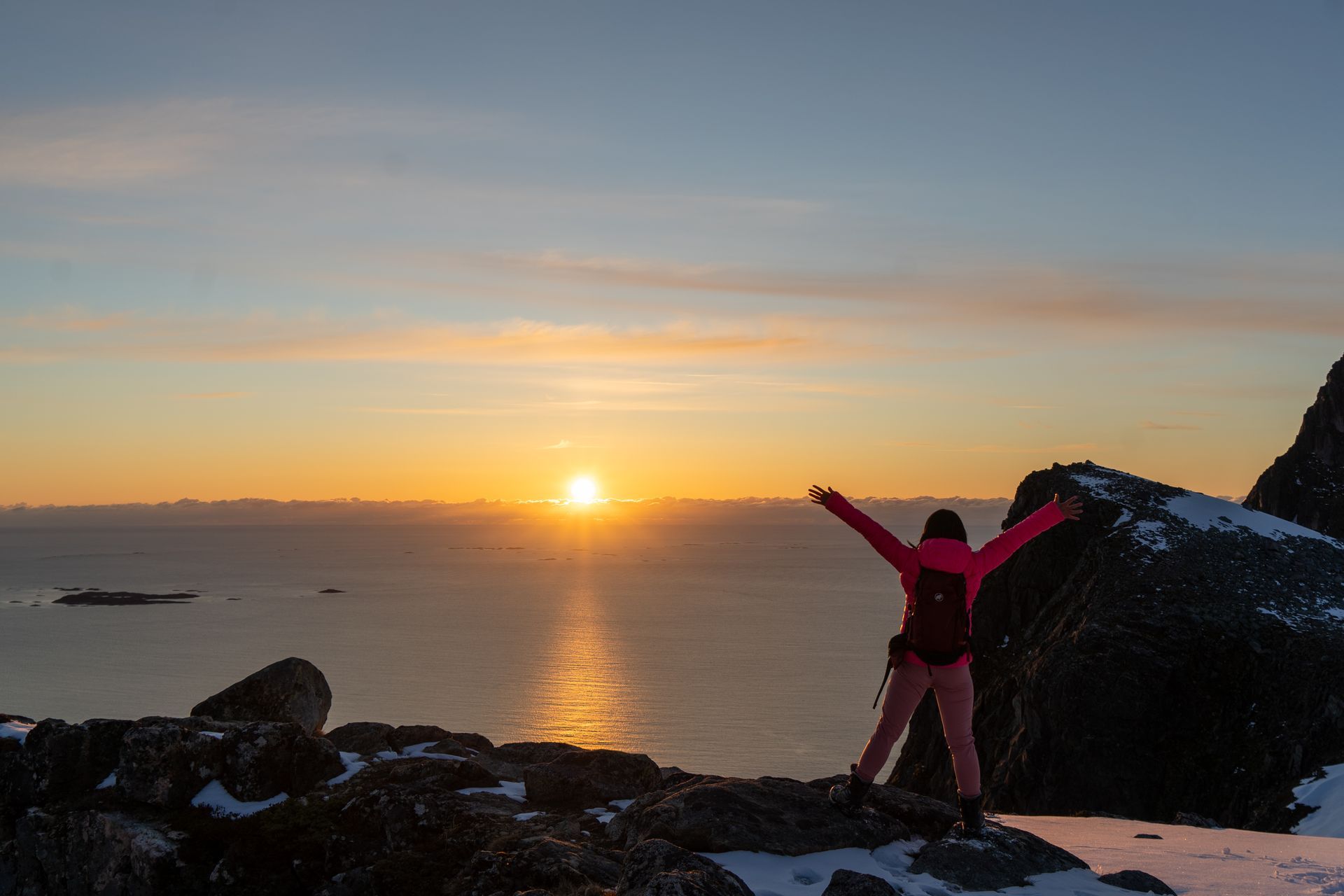Sunset over Tromsø mountains during Unique Norway hiking tour