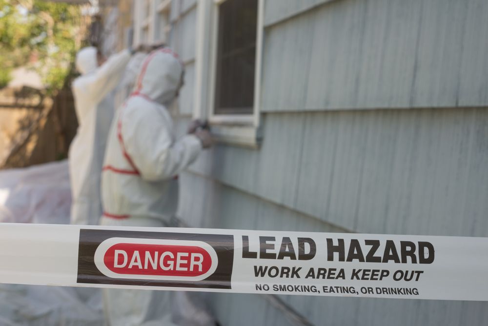 Lead hazard work area keep out sign on a house