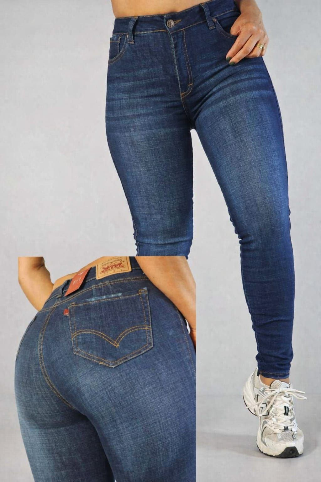 Pantalones vaqueros ajustados de color azul oscuro con costuras naranjas, mostrados en una modelo, vistas frontal y trasera.