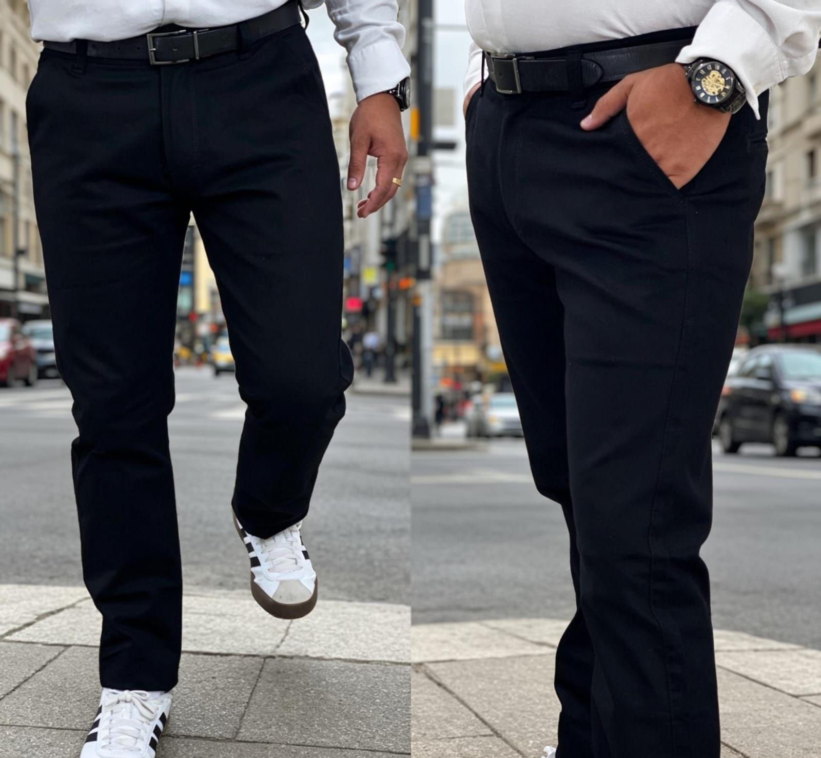Dos personas con camisas blancas y pantalones negros caminando por una calle de la ciudad,