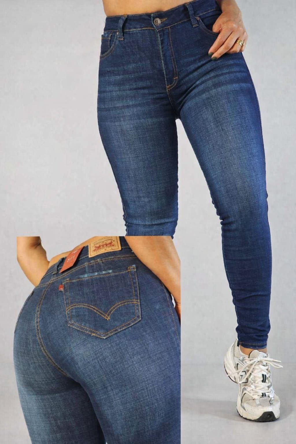 Pantalones vaqueros ajustados de color azul oscuro con costuras naranjas, mostrados en una modelo, vistas frontal y trasera.