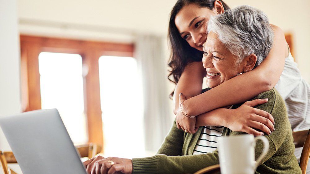 Senior Woman Hug By Daughter — Sarasota, FL — Insurance Service of Sarasota, Inc.