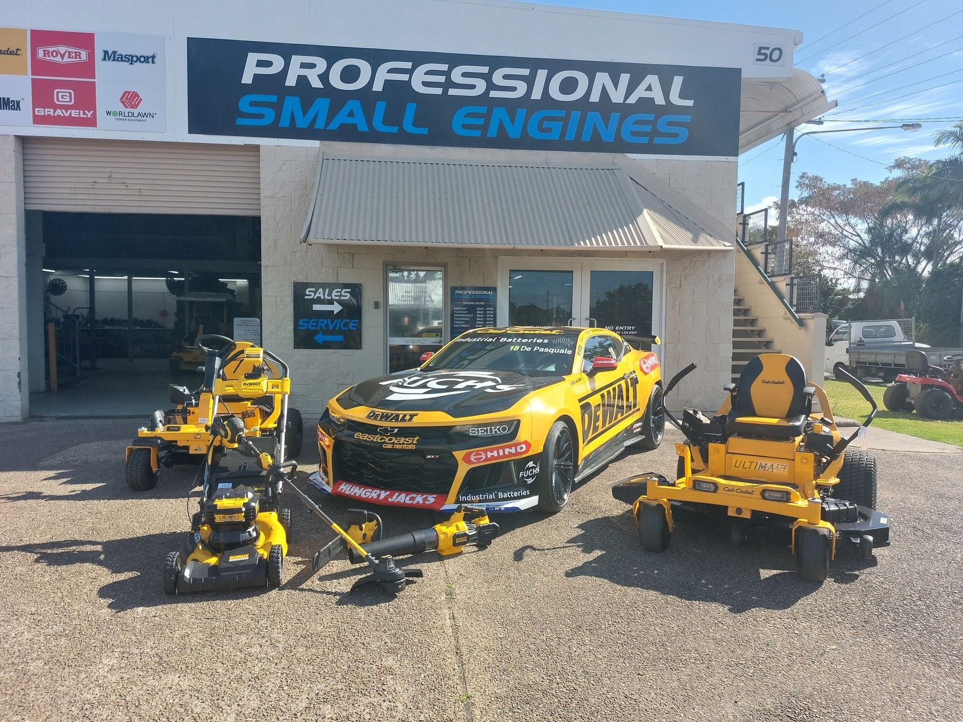 Professional Small Engines Store With Yellow Equipment — Professional Small Engines in Bowen, QLD