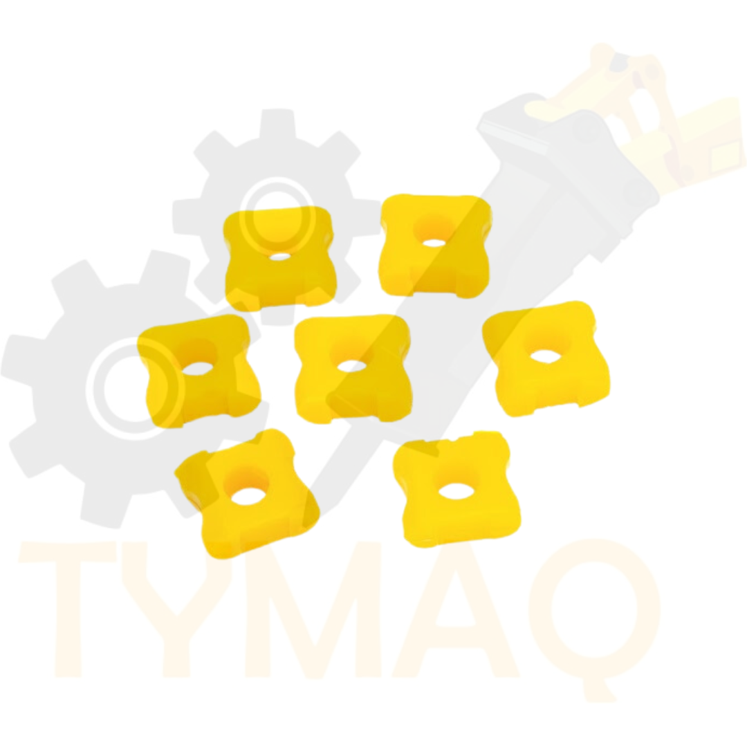 Siete bujes de goma de color amarillo, de forma cuadrada y con un orificio en el centro.