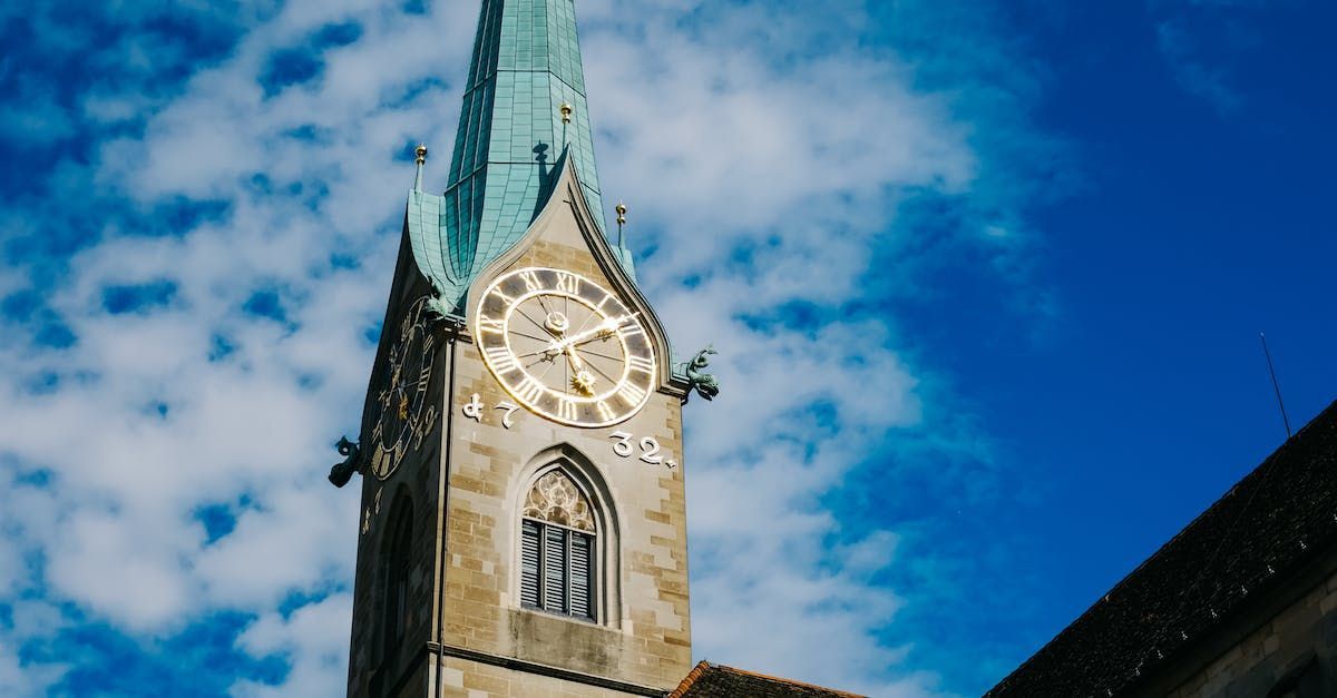 a clock tower with the number 32 on it