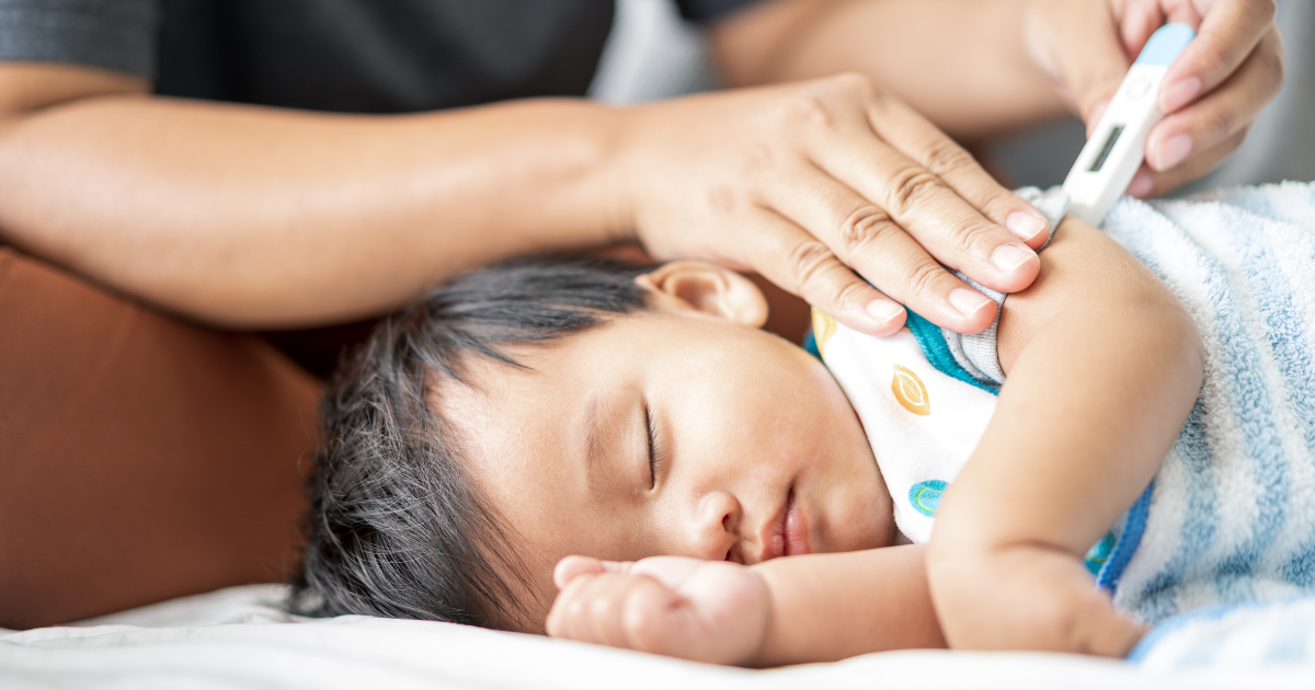 thermometer under baby's arm