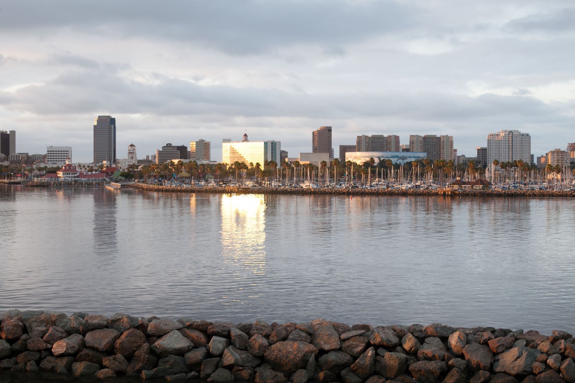 Downtown Long Beach skyline across the marina at dusk