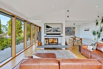 Photo showing renovated modern lounge room at Channel Hwy house