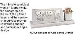 Custom sandstone memorial marker with slanted and pitched panels and engraved “IRELAND” text