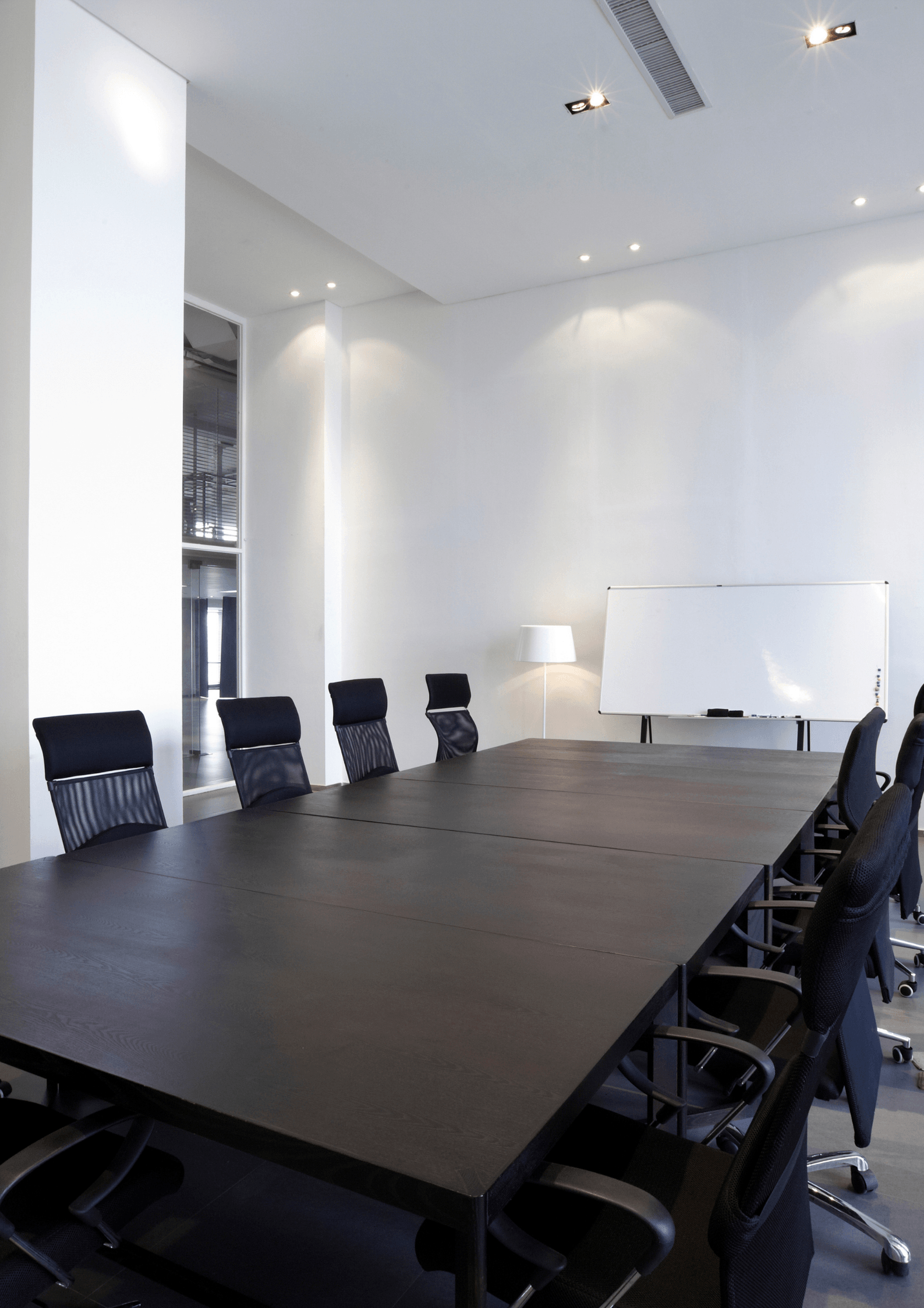 This is a picture of a conference room that has been painted by painter and decorator Leicester. This is a commercial painting a job using white paint for the walls Commercial painting Leicester