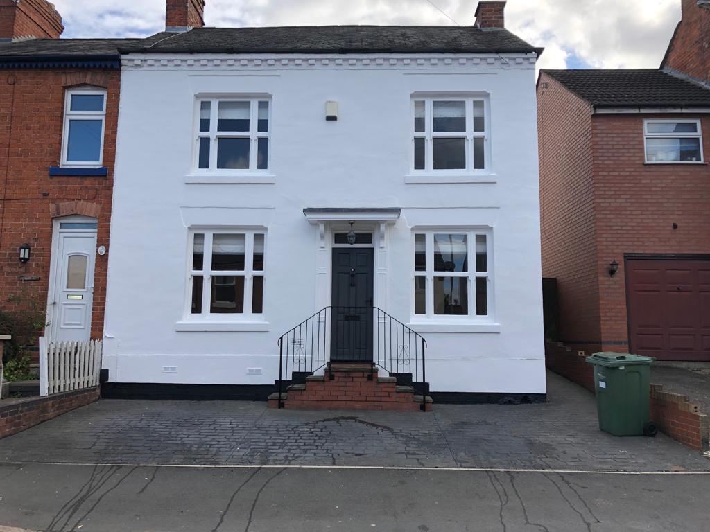 This is a picture of the exterior painting on a house. The external paint used is white. This was painted by Painter and decorators Leicester