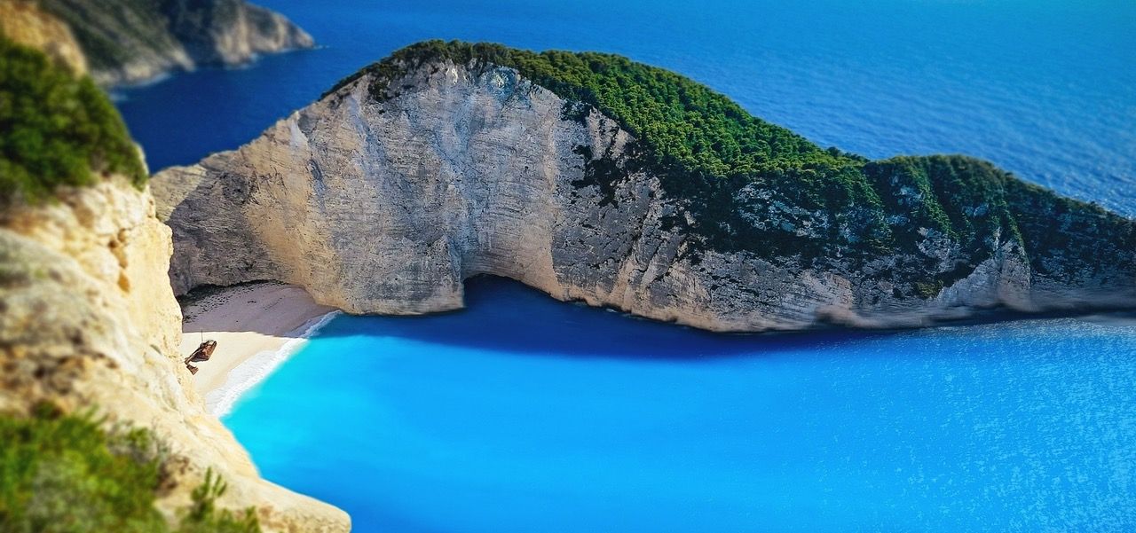 There is a small island in the middle of the ocean.