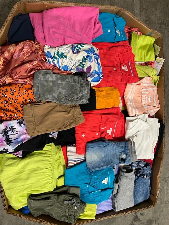 truckload with 24,000 pieces of clothing from target stores on 24 pallets
