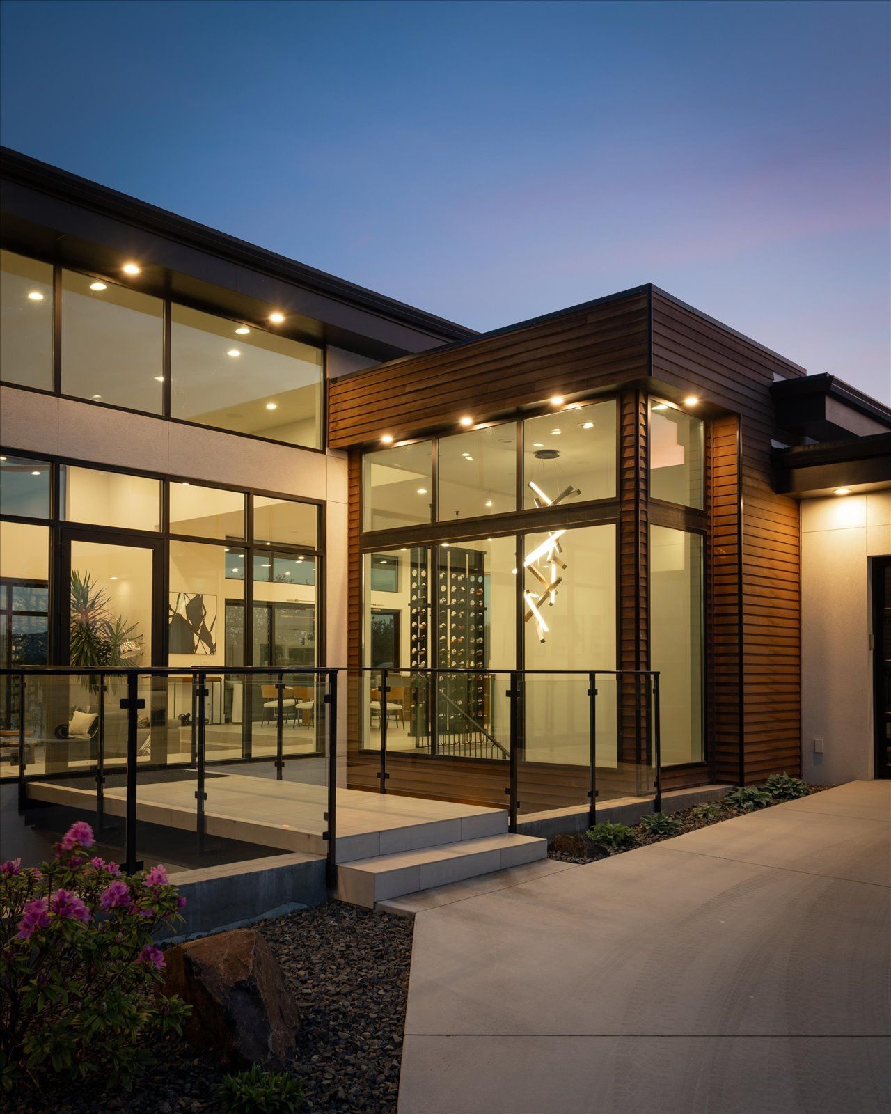 A large house with a lot of windows and a balcony