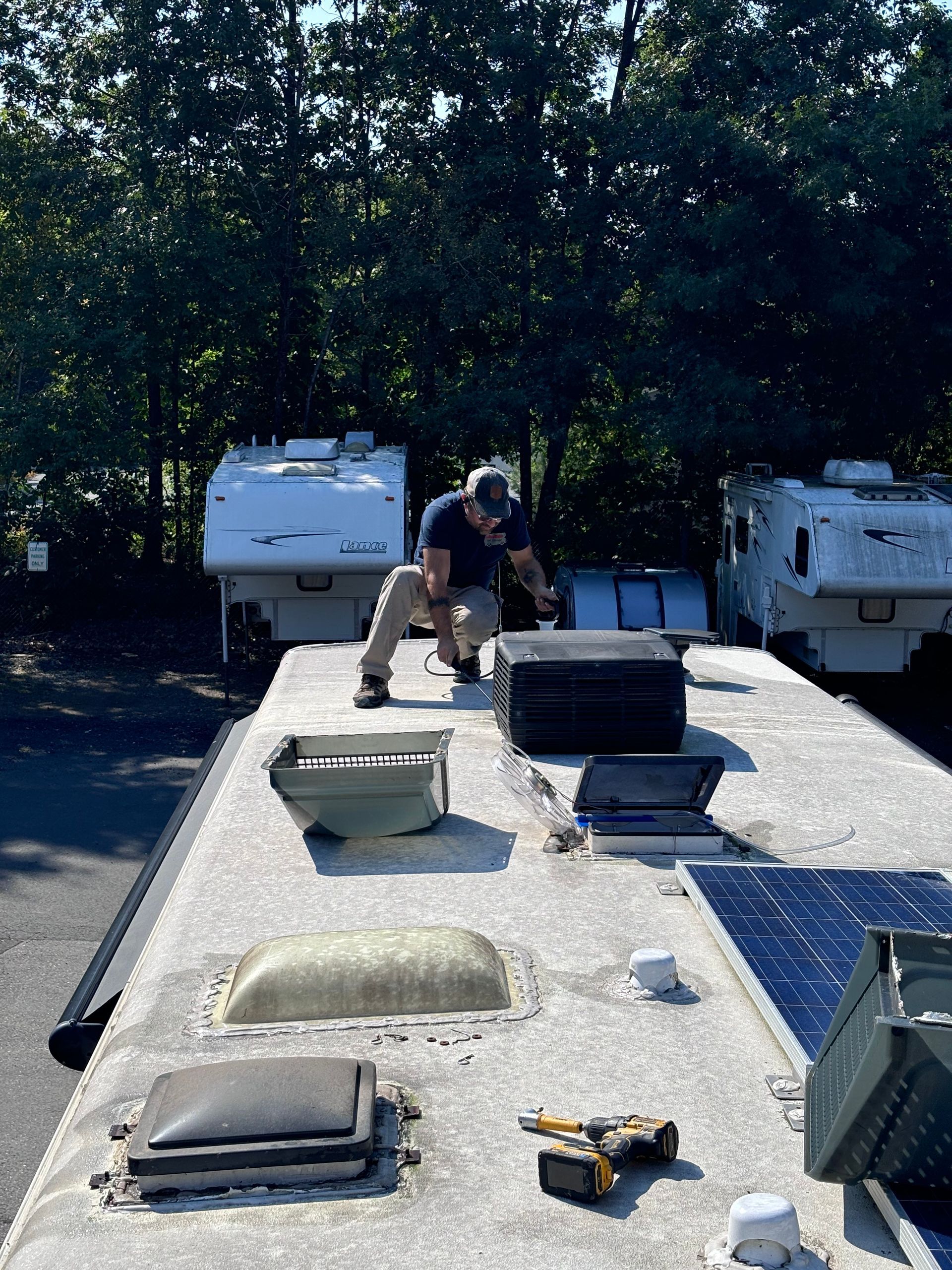 Man working on RV Roof