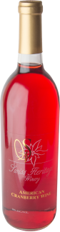 Bottle of red cranberry wine with gold foil.