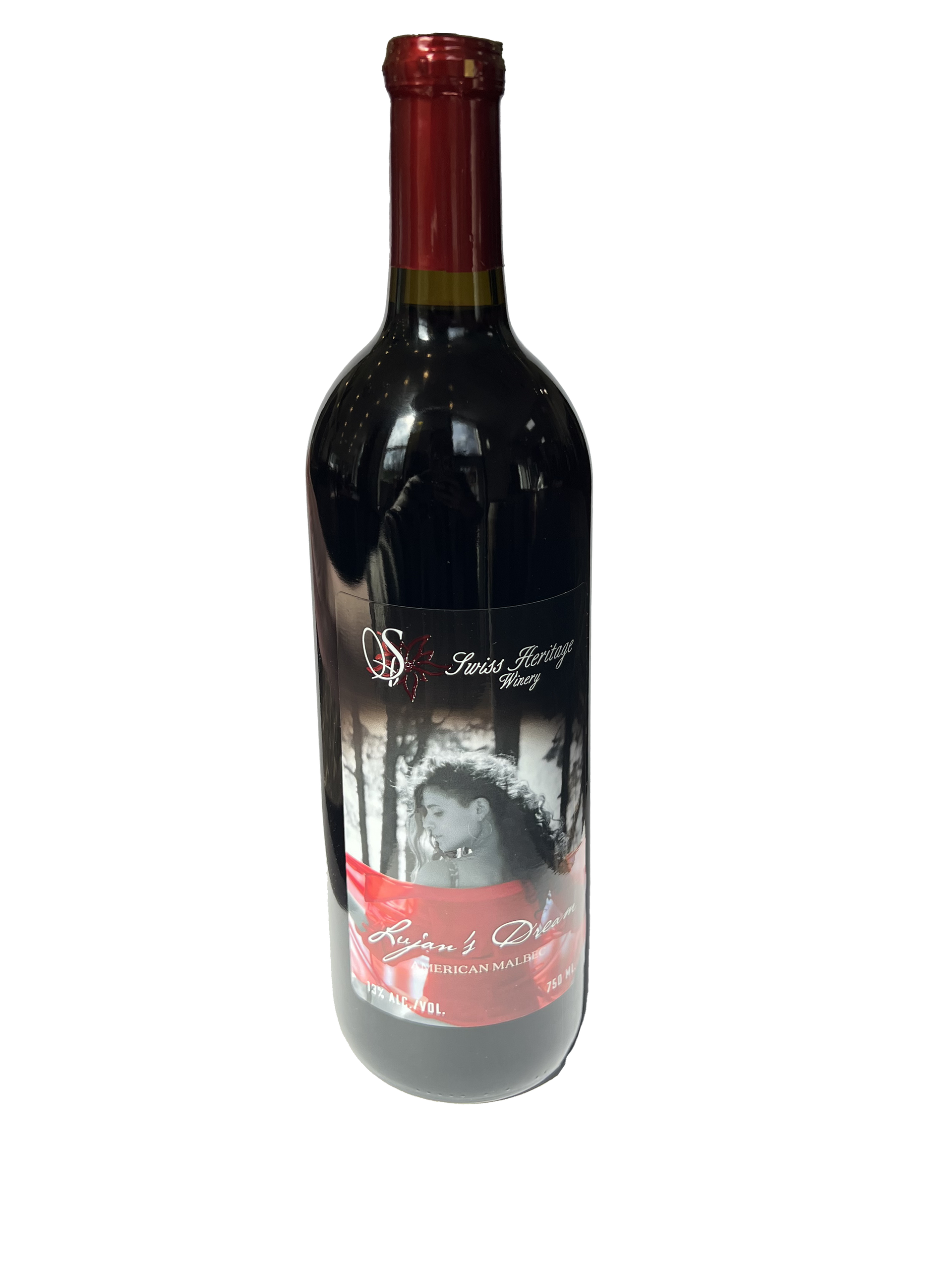 Bottle of red wine with a label featuring a black and white photo of a woman in a forest.
