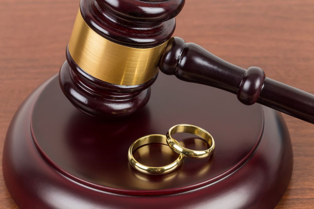 Wedding Rings on Table — Mitchell Playford & Radburn Solicitors in Casino, NSW