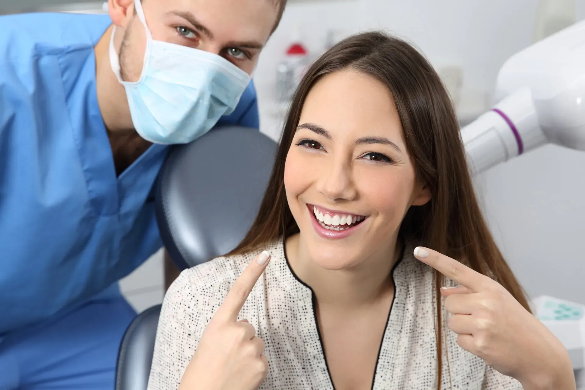 Happy Patient With Dentist Smiling — Columbia, SC — University Dental PA