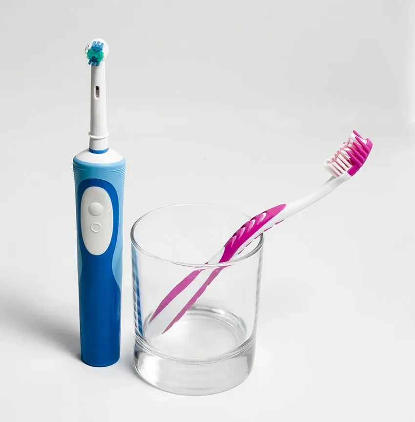 Electric Toothbrush And Traditional Toothbrush — Columbia, SC — University Dental PA Electric Toothbrush And Traditional Toothbrush — Columbia, SC — University Dental PA